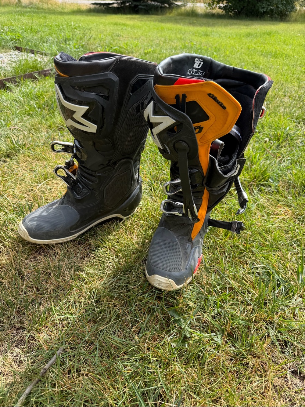 Alpinestars  Black and Orange Motocross Boots with White Accents